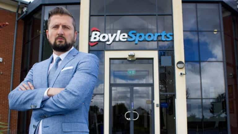 CEO Conor Gray in front of a BoyleSports shop.