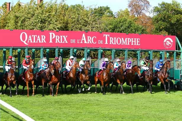 Longchamps starting stalls bursting open.