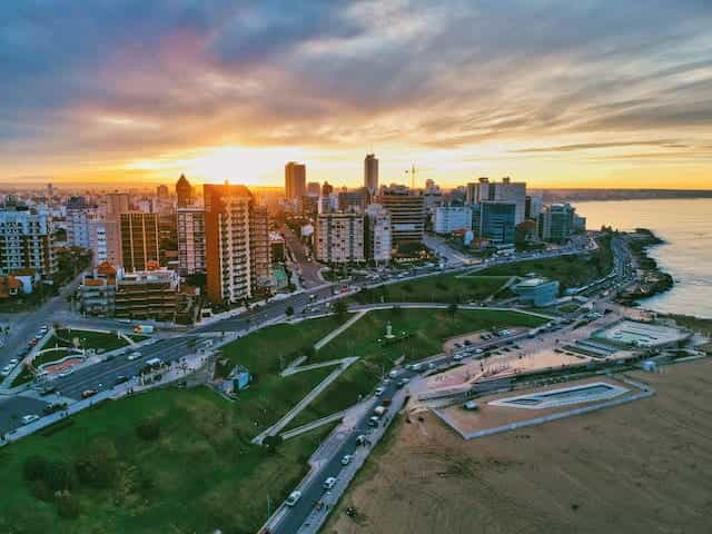 Part of the coastline of Mar del Plata, Argentina, at sunset.