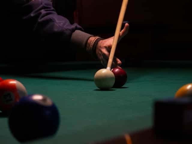 Snooker balls on a green table.