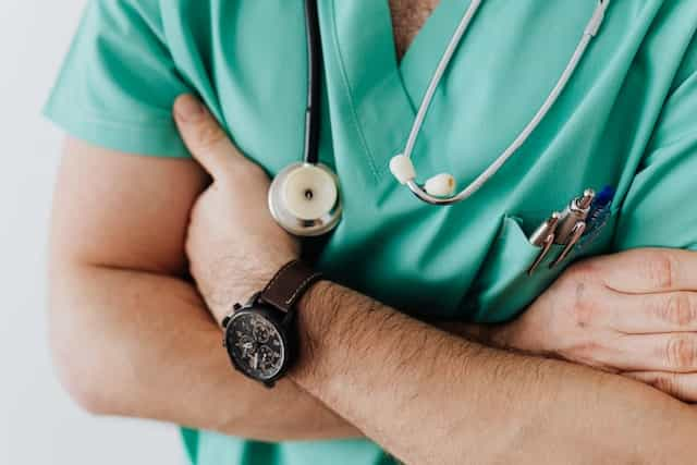 An NHS doctor with a stethoscope.